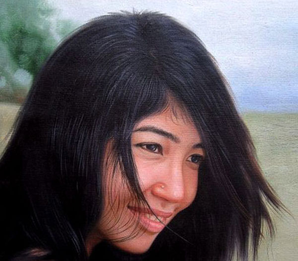 Beautiful oil portrait self girl on a beach windy hair
