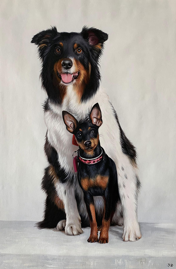 dogs portrait big dog hugging a small dog