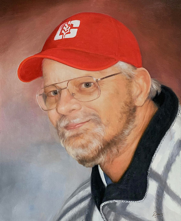 Close up oil portrait of a man with a red cap