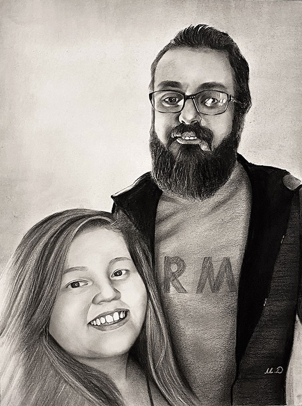 Personalized charcoal painting of a man and a girl