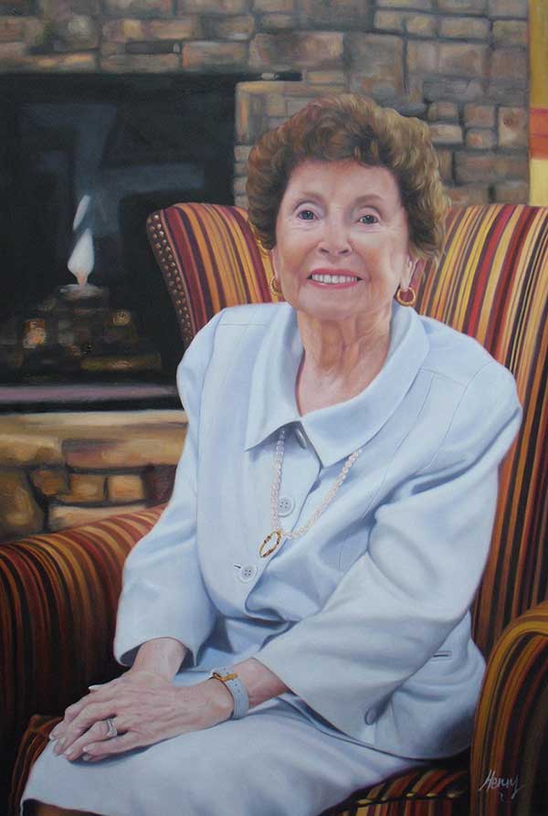 a custom oil painting of an eldery woman sitting by fire
