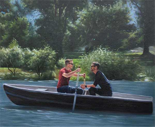 male couple in a bout on a lake romantic