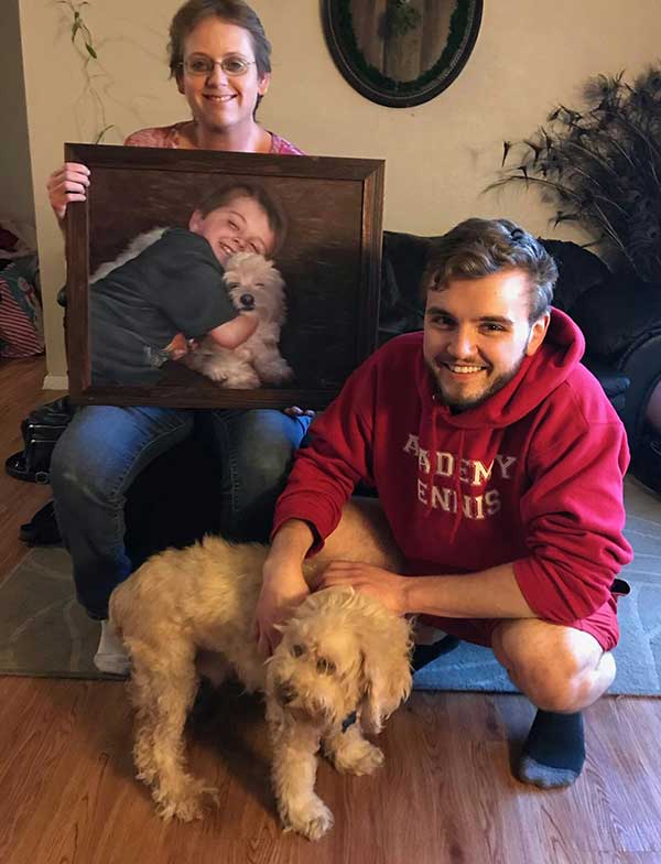 a gift painting for a little kid and his white dog