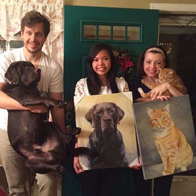 oil portraits of a dog and a cat