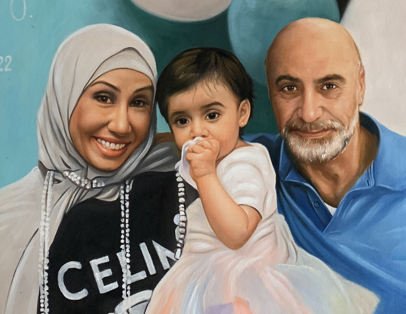 Painted portrait of a family: a woman in a hijab, a toddler, and a balding man.