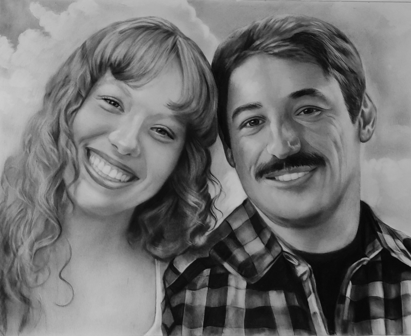 Black and white portrait of a smiling couple.