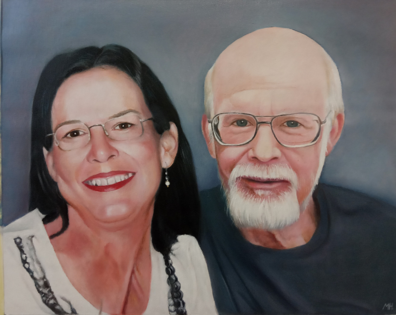 Oil painting portrait of a woman and man.