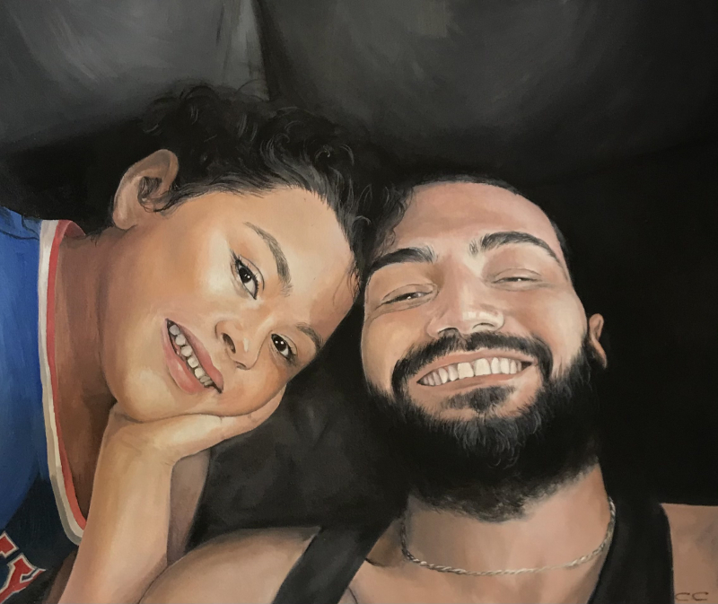Painting of a man and child lying down, smiling at the camera.