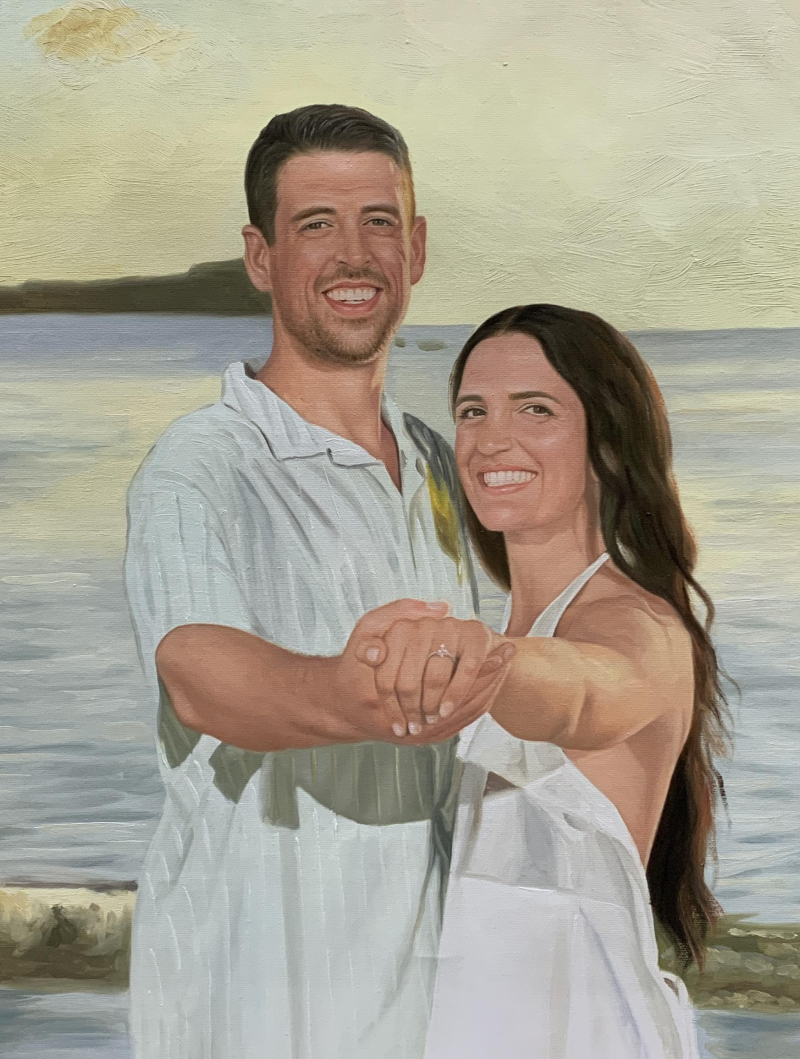 Oil painting of an engaged couple holding hands by the ocean