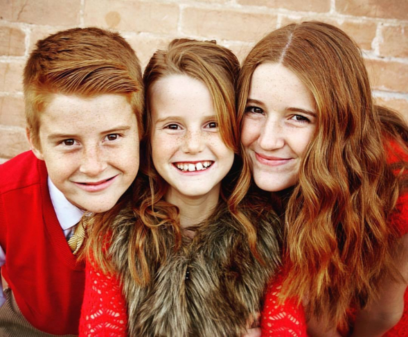 an oil painting of kids family