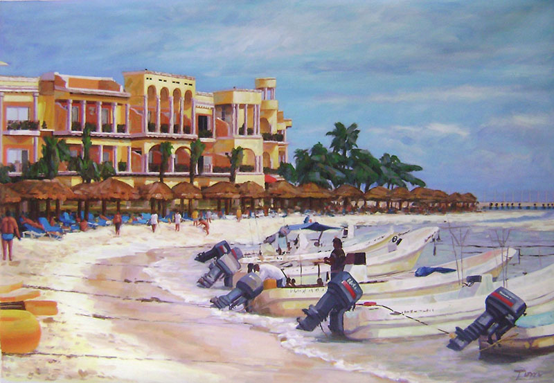 Beach scene with hotel, boats, and people.
