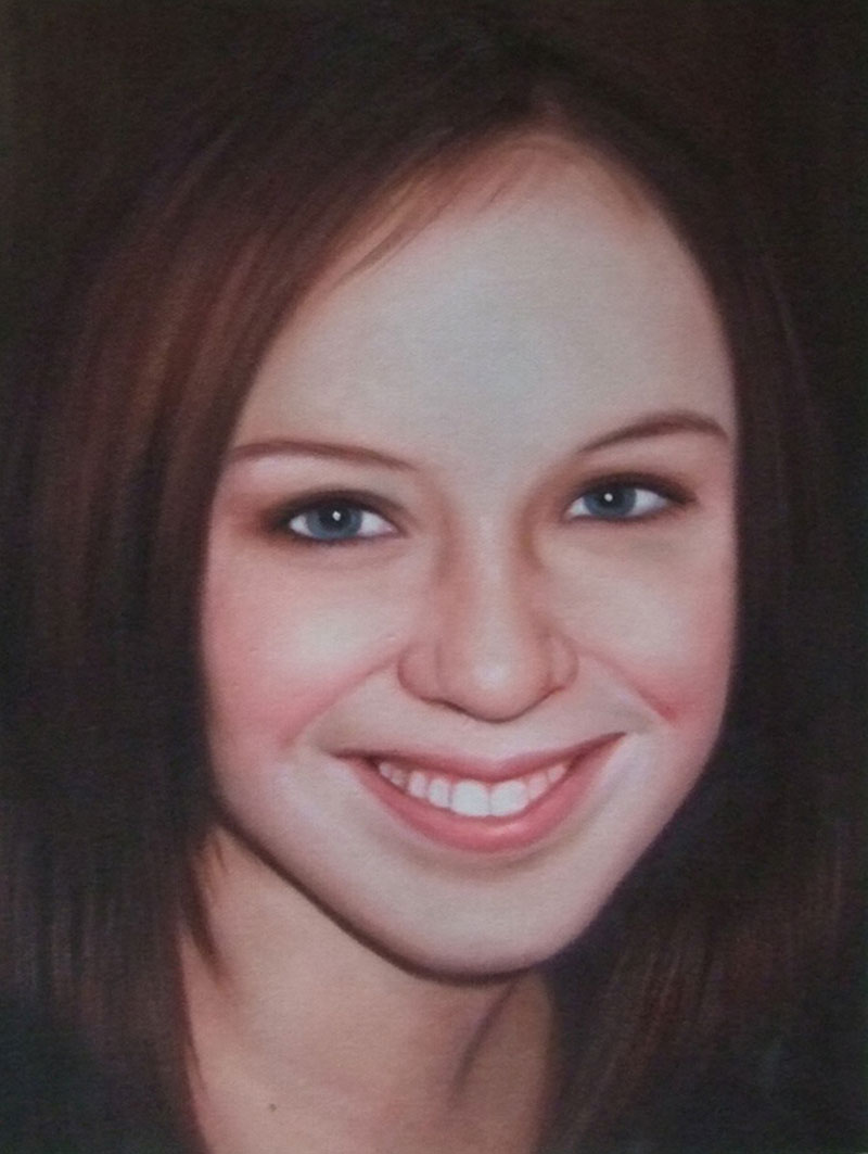 a custom oil portrait of a young woman with blue eyes