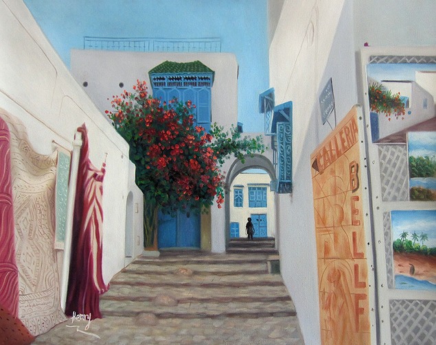 Painting of a narrow alleyway with white buildings, red flowers, and displayed rugs and artwork.