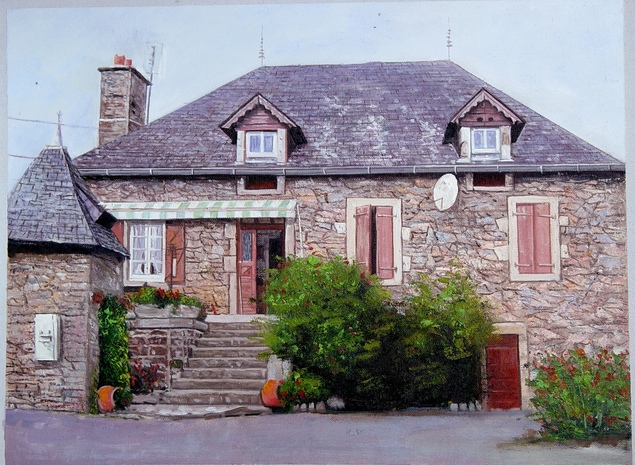 Stone house with slate roof, green awning, and red shutters.